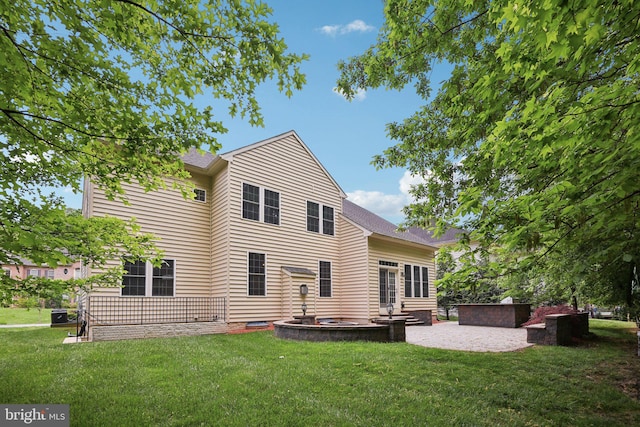 711 Bleak Hill Pl, Upper Marlboro, MD 20774 - back of house with a patio and a yard