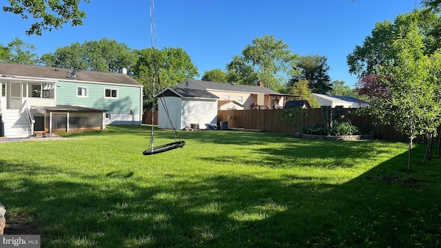 view of yard with a shed and an outdoor structure