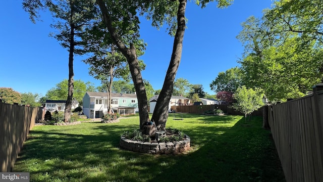 view of yard featuring a residential view