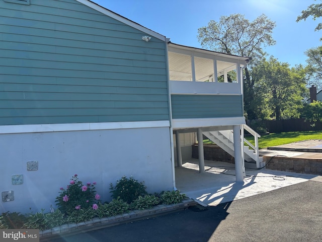 view of home's exterior with a patio area