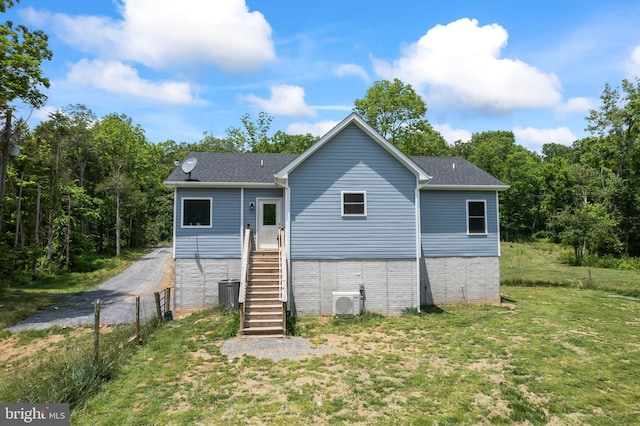 3612 Panhandle Rd, Front Royal, VA 22630 - back of house featuring a lawn, roof with shingles, central air condition unit, and a cooling unit
