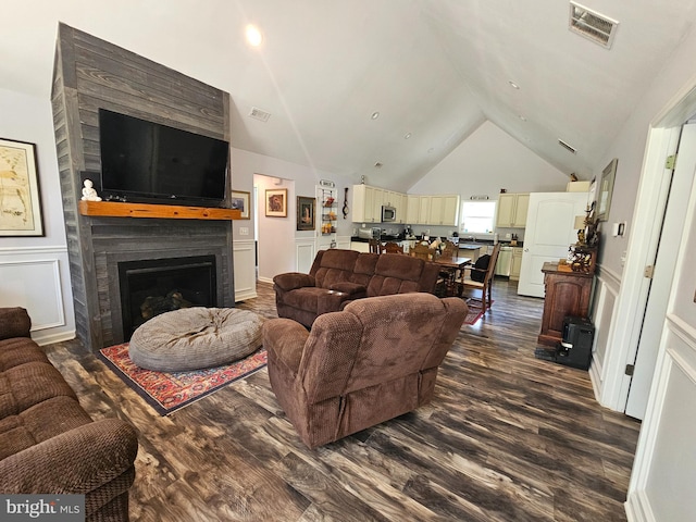 3612 Panhandle Rd, Front Royal, VA 22630 - living room with dark wood-style floors, a fireplace, and high vaulted ceiling
