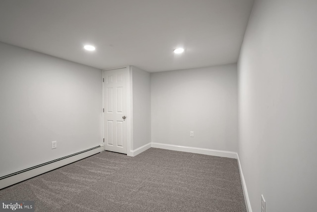 finished basement featuring baseboard heating, recessed lighting, carpet floors, and baseboards