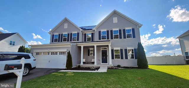 9508 Mourning Dove Way, Delmar, MD 21875 - traditional-style home featuring covered porch, a garage, and asphalt driveway