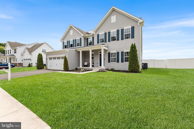 9508 Mourning Dove Way, Delmar, MD 21875 - view of front of house featuring asphalt driveway, covered porch, and cooling unit