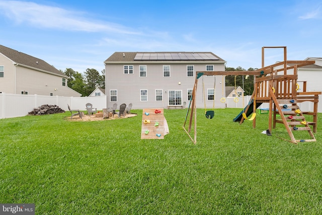 9508 Mourning Dove Way, Delmar, MD 21875 - back of property with a playground, solar panels, and a patio