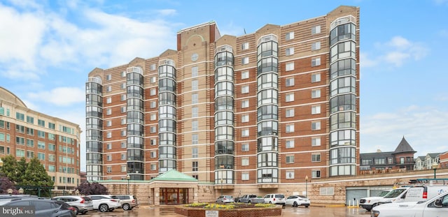 24 Courthouse Sq Unit 710, Rockville, MD 20850 - view of apartment building / complex featuring uncovered parking
