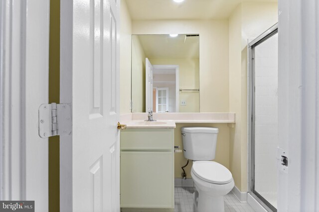 24 Courthouse Sq Unit 710, Rockville, MD 20850 - full bathroom with tile patterned flooring, toilet, a shower stall, and vanity
