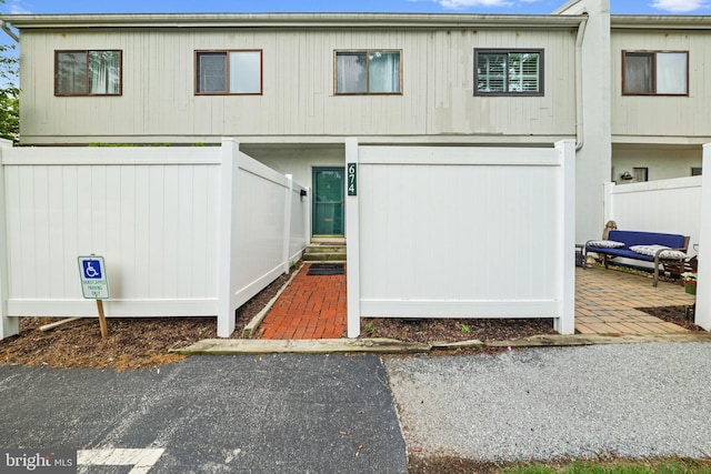 view of front of property with fence