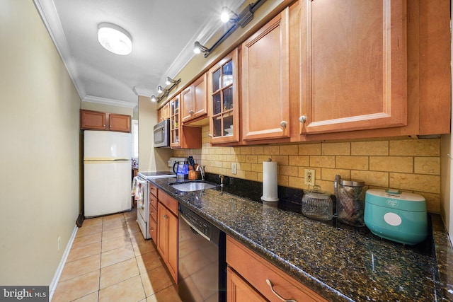 kitchen featuring white appliances, crown molding, a sink, brown cabinets, and backsplash
