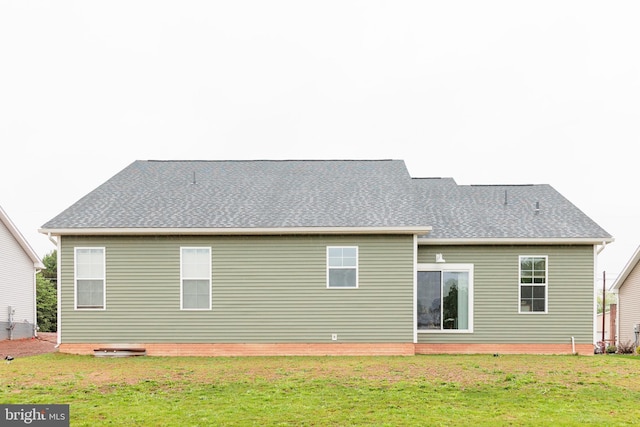 205 Kinneman Rd, Abbottstown, PA 17301 - rear view of house with a lawn and roof with shingles