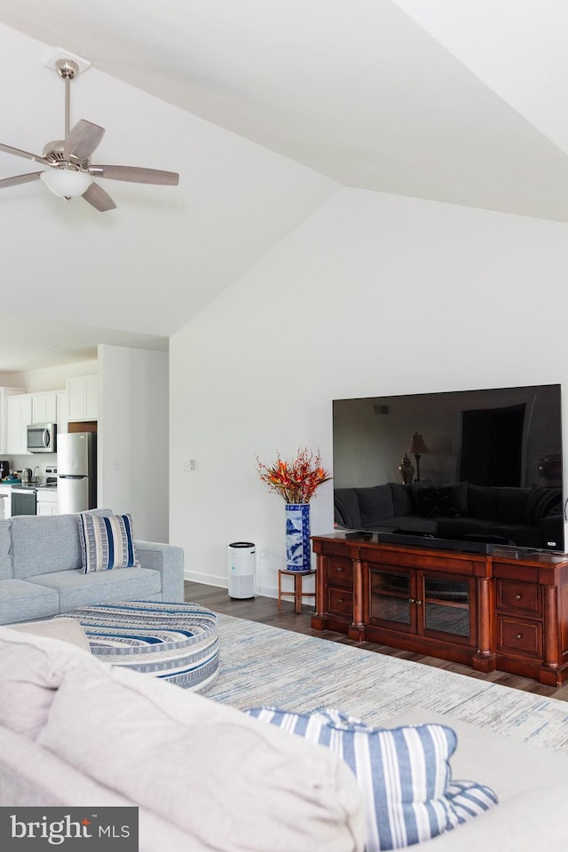 205 Kinneman Rd, Abbottstown, PA 17301 - living area featuring wood finished floors, ceiling fan, and high vaulted ceiling