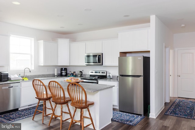 205 Kinneman Rd, Abbottstown, PA 17301 - kitchen with stainless steel appliances, dark wood-type flooring, white cabinets, and recessed lighting
