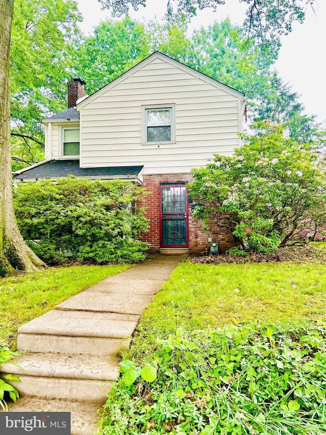 239 Glentay Ave, Lansdowne, PA 19050 - view of front of house with a chimney and brick siding
