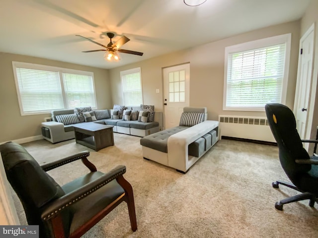 239 Glentay Ave, Lansdowne, PA 19050 - carpeted living room featuring radiator, a ceiling fan, and baseboards