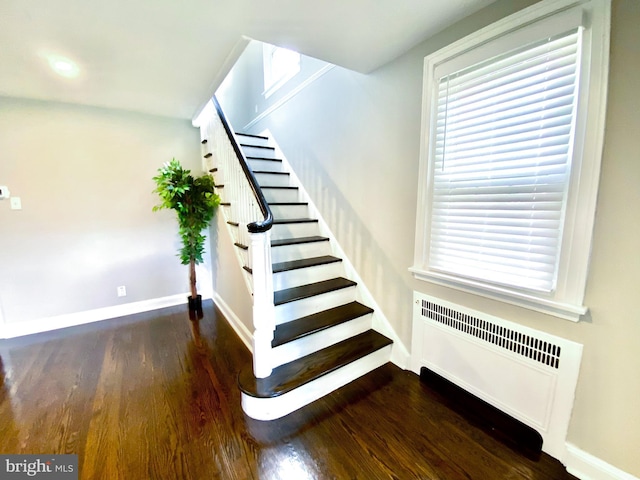 239 Glentay Ave, Lansdowne, PA 19050 - staircase featuring radiator heating unit, wood finished floors, baseboards, and plenty of natural light