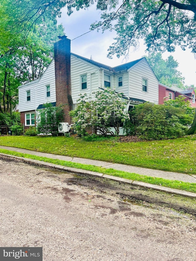 239 Glentay Ave, Lansdowne, PA 19050 - view of property exterior featuring a chimney and a yard