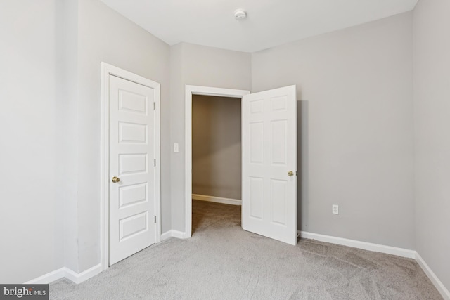 1609 N Hilton St, Baltimore, MD 21216 - unfurnished bedroom with carpet and baseboards