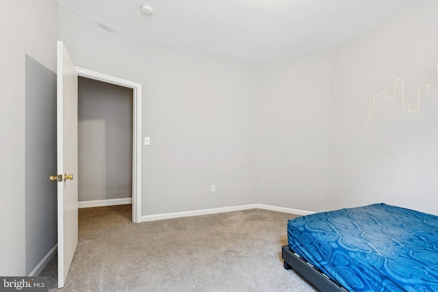 1609 N Hilton St, Baltimore, MD 21216 - carpeted bedroom featuring baseboards