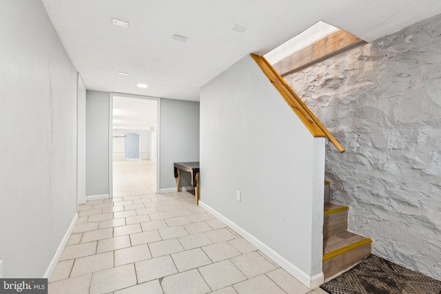 1609 N Hilton St, Baltimore, MD 21216 - basement with light tile patterned floors and baseboards