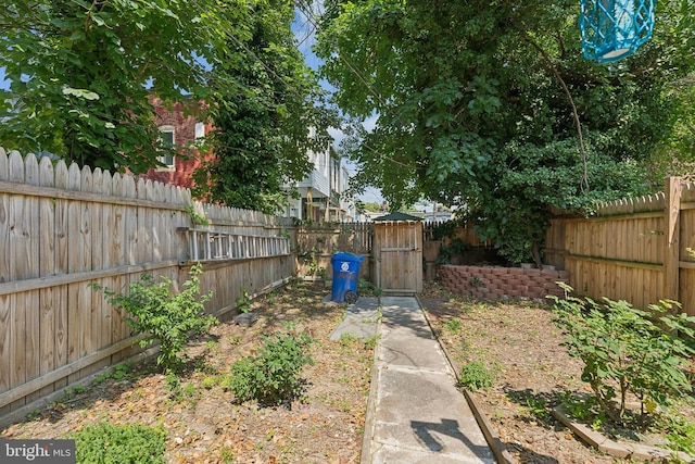 1609 N Hilton St, Baltimore, MD 21216 - fenced backyard with a gate