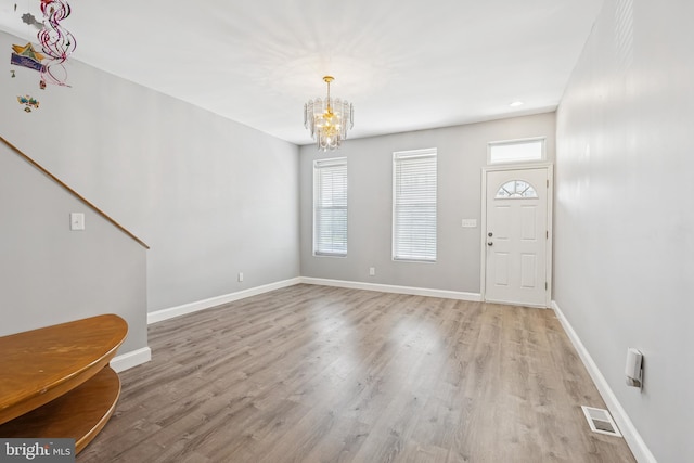 1609 N Hilton St, Baltimore, MD 21216 - foyer with a chandelier, light wood-style flooring, and recessed lighting