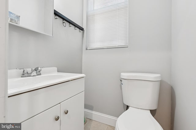 1609 N Hilton St, Baltimore, MD 21216 - half bathroom with vanity and tile patterned flooring