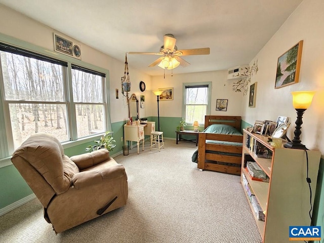 419 Camden St, Dillwyn, VA 23936 - bedroom with carpet floors, baseboards, and a wall unit AC