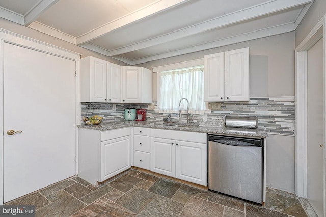 1117 Tatum St, Woodbury, NJ 08096 - kitchen featuring stainless steel dishwasher, a sink, stone tile floors, and decorative backsplash