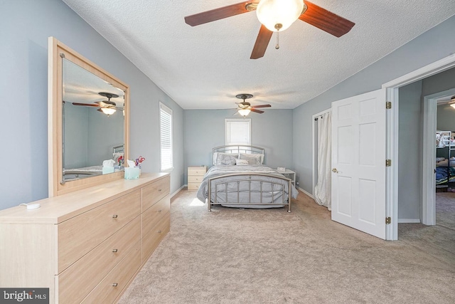 1117 Tatum St, Woodbury, NJ 08096 - carpeted bedroom with a textured ceiling and ceiling fan
