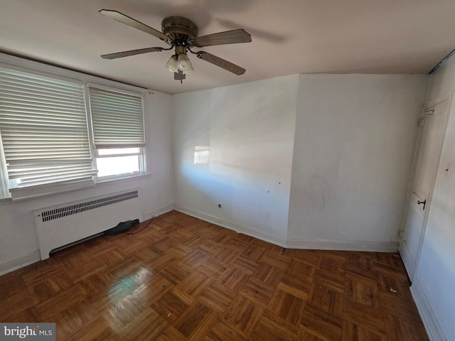 3318 Oakmont St, Philadelphia, PA 19136 - spare room featuring radiator heating unit, ceiling fan, and baseboards