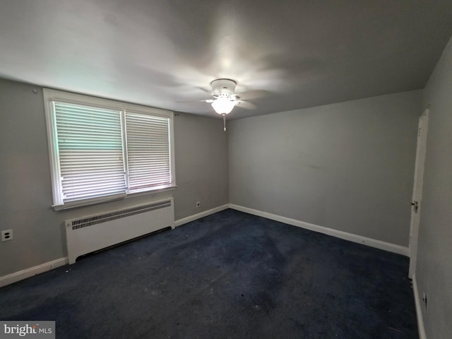 3318 Oakmont St, Philadelphia, PA 19136 - unfurnished room with radiator heating unit, ceiling fan, dark carpet, and baseboards