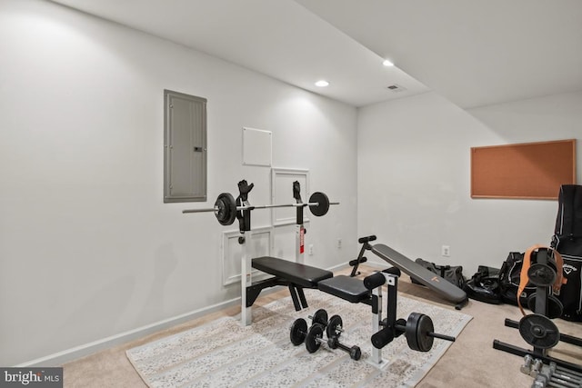 exercise room with carpet floors, electric panel, baseboards, and recessed lighting