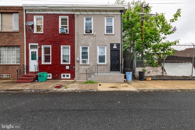 743 Cherry St, Camden, NJ 08103 - view of front of home with fence, brick siding, entry steps, and cooling unit