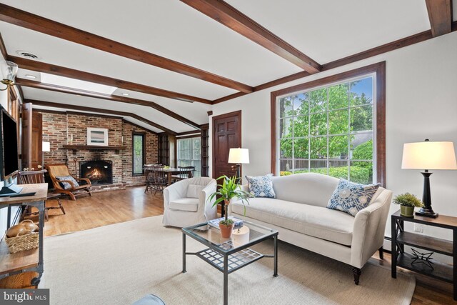 3709 Shepherd St, Chevy Chase, MD 20815 - living room featuring wood finished floors and a fireplace