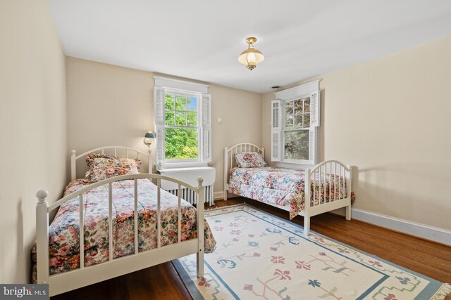 3709 Shepherd St, Chevy Chase, MD 20815 - bedroom featuring wood finished floors and baseboards