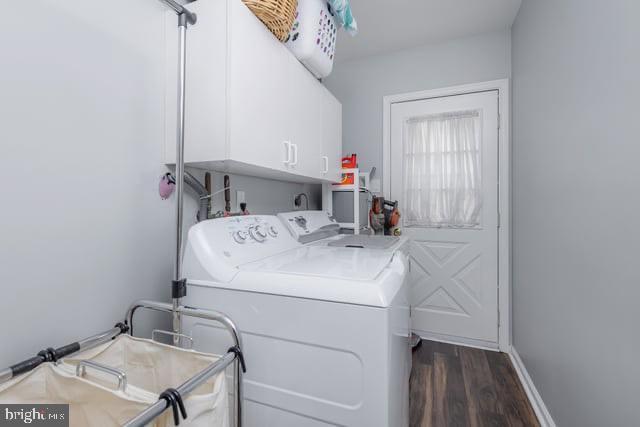 25 Aberdeen Dr, Sicklerville, NJ 08081 - laundry room featuring cabinet space, washing machine and dryer, dark wood-type flooring, and baseboards