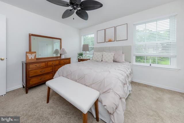 25 Aberdeen Dr, Sicklerville, NJ 08081 - bedroom with baseboards, light carpet, and a ceiling fan