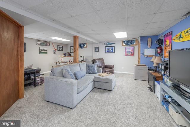 25 Aberdeen Dr, Sicklerville, NJ 08081 - living room featuring a paneled ceiling, carpet flooring, and baseboards