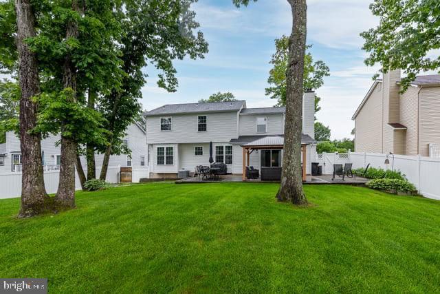 25 Aberdeen Dr, Sicklerville, NJ 08081 - rear view of house with a gazebo, a patio, and a chimney