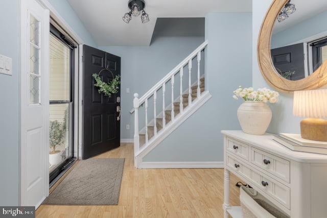 25 Aberdeen Dr, Sicklerville, NJ 08081 - foyer with stairway, light wood finished floors, and baseboards