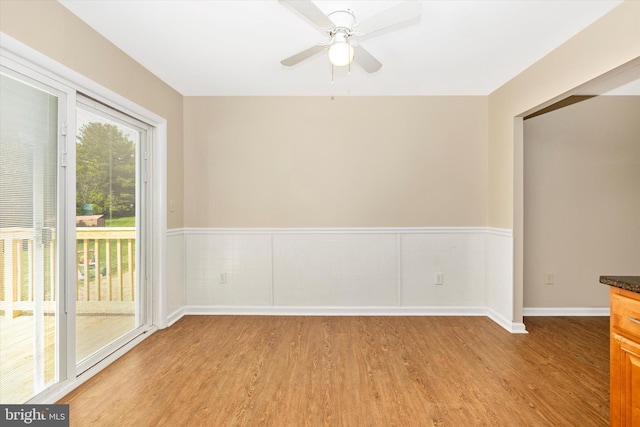 11005 Horseshoe Dr, Frederick, MD 21701 - spare room with light wood-style flooring, a wainscoted wall, ceiling fan, and baseboards