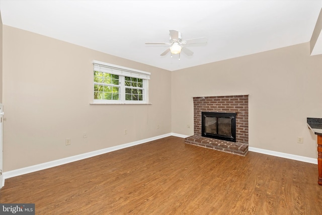 11005 Horseshoe Dr, Frederick, MD 21701 - unfurnished living room with ceiling fan, wood finished floors, a fireplace, and baseboards