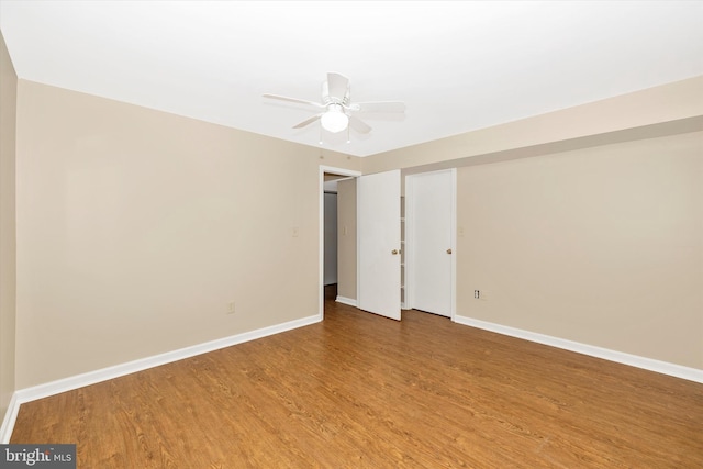 11005 Horseshoe Dr, Frederick, MD 21701 - empty room with wood finished floors, baseboards, and a ceiling fan