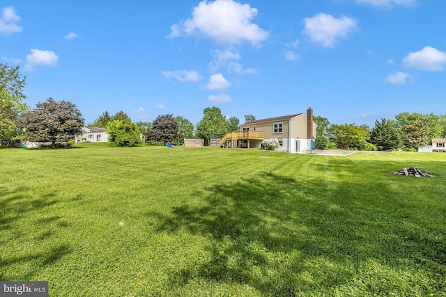 11005 Horseshoe Dr, Frederick, MD 21701 - view of grassy yard with a wooden deck and stairs