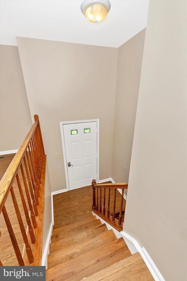 11005 Horseshoe Dr, Frederick, MD 21701 - foyer entrance with light wood-style floors, baseboards, and stairway
