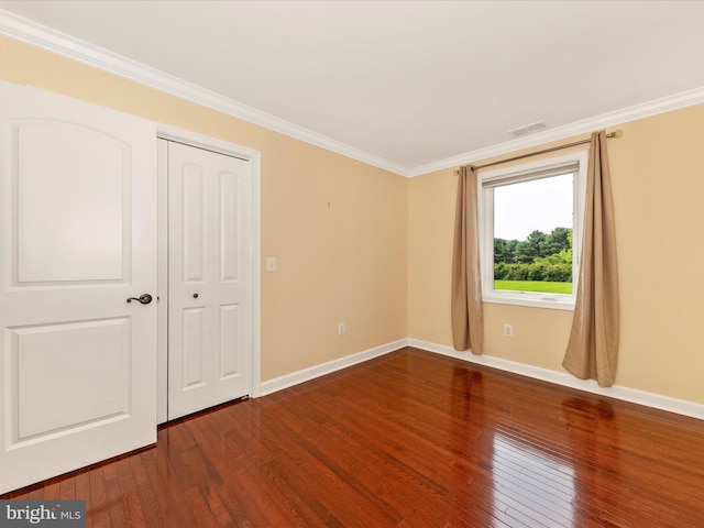 22028 Beaverbrook Dr, Smithsburg, MD 21783 - unfurnished bedroom featuring wood finished floors, ornamental molding, baseboards, and a closet