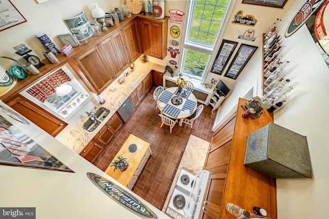 living room with brick patterned floors