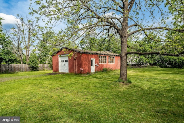 view of outbuilding with an outdoor structure and driveway