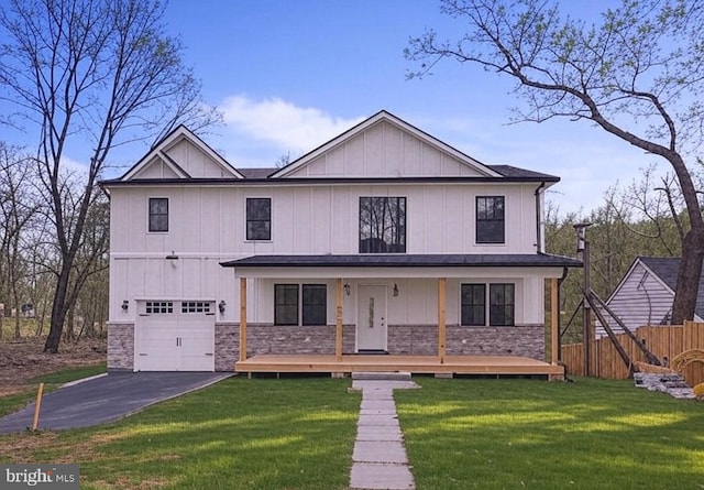 901 E Quaker Bottom Rd, Sparks Glencoe, MD 21152 - modern inspired farmhouse featuring stone siding, an attached garage, asphalt driveway, and board and batten siding